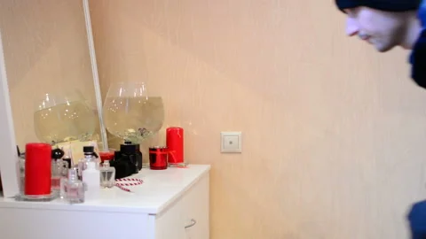 The robber broke into the house. Thief looking for money in the house Stock Footage 89044133