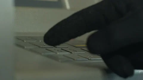 Robber in gloves inserting pin code on ATM, stealing money from bank account Stock Footage 92603438