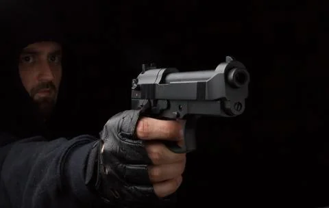 Robber with gun Stock Photos
