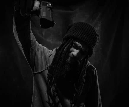 Robber with gun Stock Photos