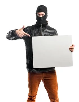 Robber holding an empty placard Stock Photos