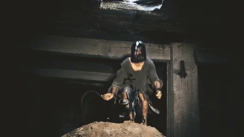 The robber with the knife jumps down and walks forward. Stock Footage 80240652