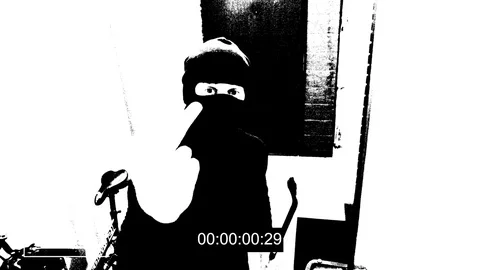 Robber shows the middle finger in the camera threshold effect Stock Footage 83723751