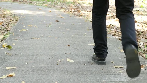 Robber steal falling wallet from walking man Stock Footage 100656120