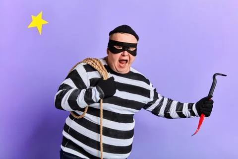 Robber stealing, sneaking up the flat Stock Photos