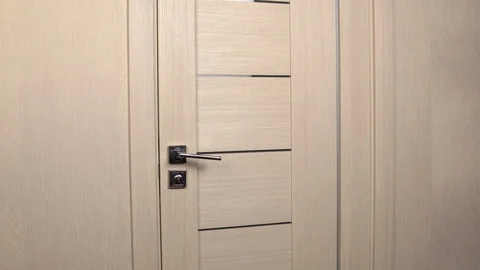 The robber stole a pack of rubles. The masked bandit carefully entered through Stock Footage 123735891