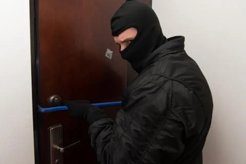 Robber Tries To Break In Stock Photos