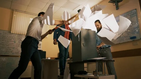 Robbers try to hack and open a stolen bank safe with money and gold Stock Footage 105294610