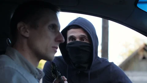 Robbery of a man in a car Stock Footage 132948474