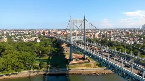 Robert F Kennedy bridge overlooking Astoria Park and Queens, NY. Traffic Stock Footage