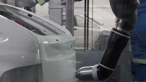 Robot 27The robot paints the car body at the car factory, Close-up. 스톡 동영상 122335751