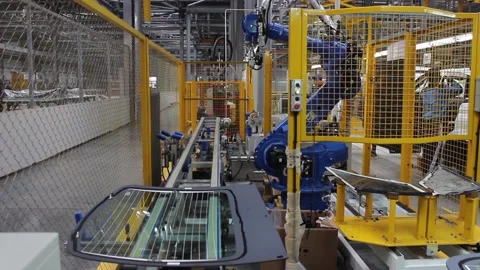 Robot 28The robot is working on the conveyor at the car factory. 스톡 동영상 122335752