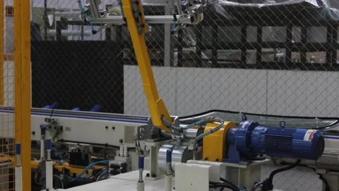 Robot 36The robot is working on the conveyor at the car factory. Stock Footage 122335784
