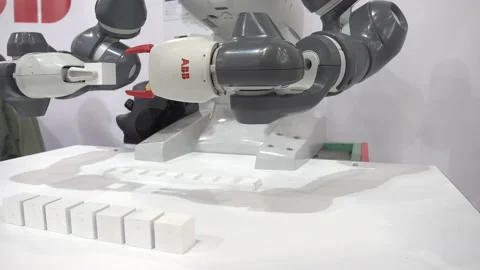 The robot adds cubes with letters Stock Footage 143089296