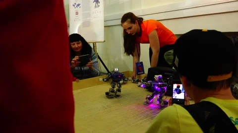 Robot.  AI.  Children playing with robots. New technologies. Stock Footage 50225344