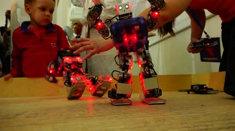 Robot.  AI.  Children playing with robots. New technologies. Stock Footage 50226697