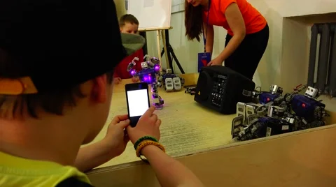 Robot.  AI. Children playing with robots. New technologies. Stock Footage 50226705