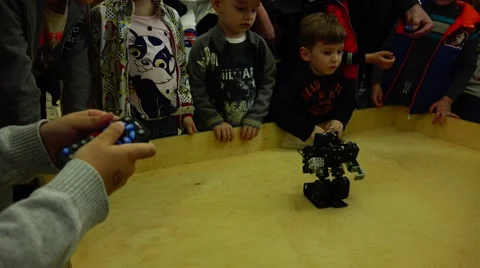 Robot.  AI. Children playing with robots. New technologies. Stock Footage 50228018