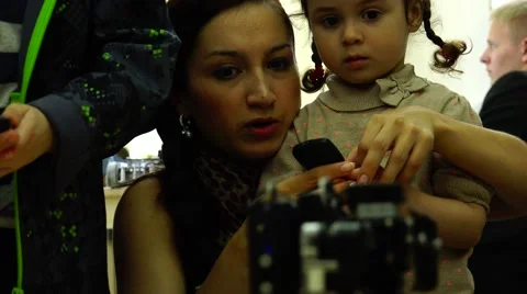 Robot.  AI. New technologies. Children playing with robots. Stock Footage 50227943
