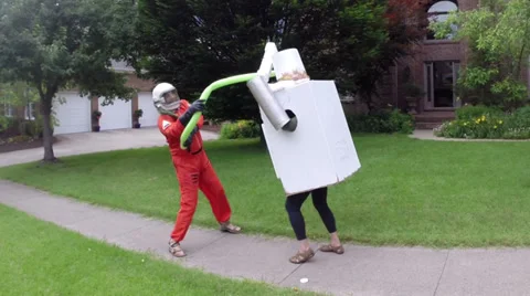 Robot and astronaut fighting knockout Stock Footage 39384966