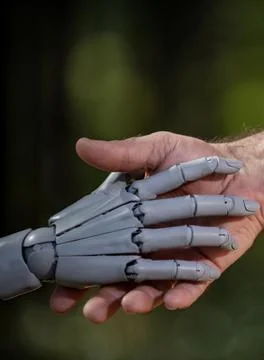 Robot and human hands in global partnership. Robotic hands with human agreeme Stock Photos
