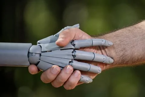 Robot and human hands in technology future. Robotic hands with human innova.. Stock Photos
