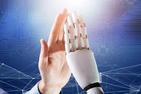 Robot And Man Giving High Five Stock Photos
