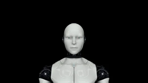 Robot android is activated and raises its head. The camera zooms in. On a black 스톡 동영상 126350518