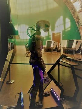 Robot android with mechanical arms and legs Stock Photos