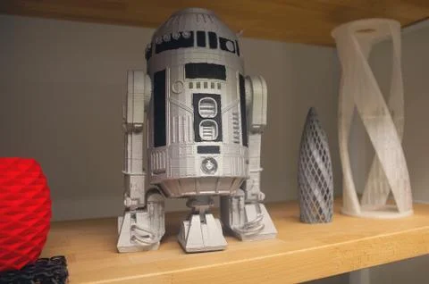 Robot-android model is printed on a 3d printer. Technologies Stock Photos