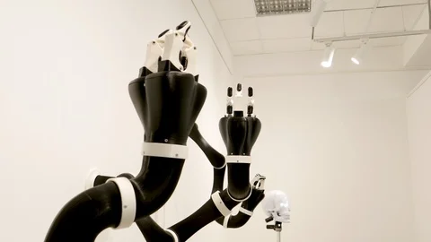 The robot arm can be compressed and decompressed on the exhibition of Stock Footage 121380189