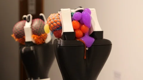 The robot arm can be compressed and decompressed on the exhibition of Stock Footage 121381519