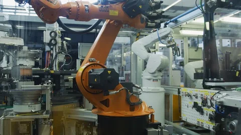 Robot Arm in High Tech Production Plant - Computerized Chip Manufacturing Stock Footage 98692103