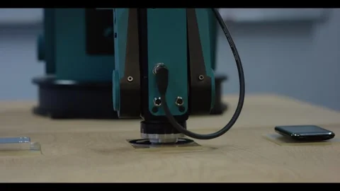 Robot Arm Inspecting Smartphone and Sample Plates on Workbench, Testing Lab Stock Footage 341298391