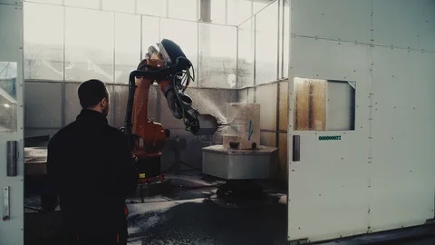 The Robot Arm Performs Work at the Plant Stock Footage 106452894