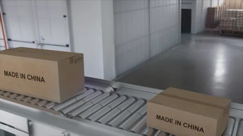 The Robot arm picks up the cardboard box Made in China. Cardboard boxes with Stock Footage 251747975
