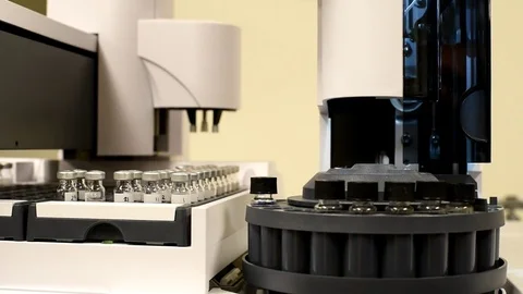 Robot arm placing chemical compound into Mass Spectrometer, detail view. Stock-Footage 82841911