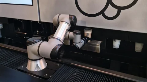 Robot Arm Serving Hot Coffee in Cafe, Seoul, South Korea Stock Footage 336259148