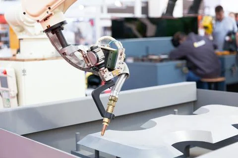 Robot arm for welding Foto stock