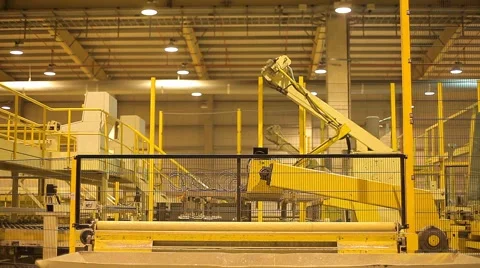 The robot arm will automatically work and move products to a industrial plant Stock Footage 58942410