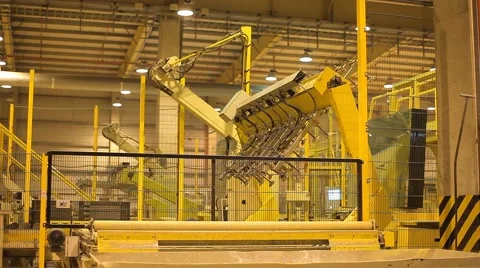 The robot arm will automatically work and move products to a industrial plant Stock Footage 59006281