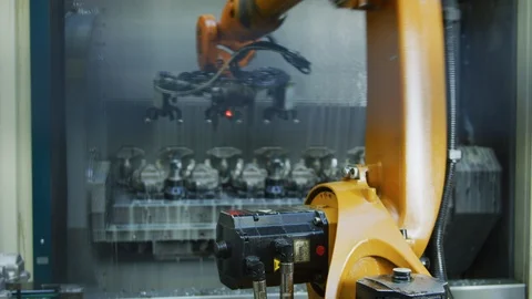 Robot Arm working in Automated Mass Production Plant - Automation Stock Footage 98697581
