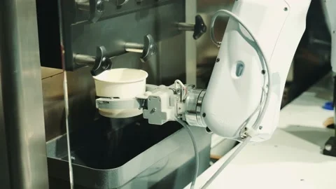 Robot with artificial intelligence making coffee on coffee machine Stock Footage 143400264