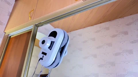 Robot assistant at home for cleaning windows. Stock Footage 150028564