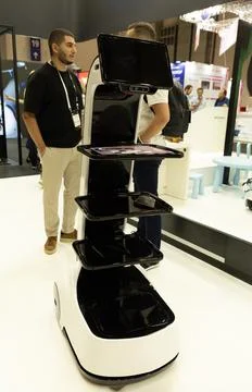 Robot assistant showcasing technology at exhibition 库存照片