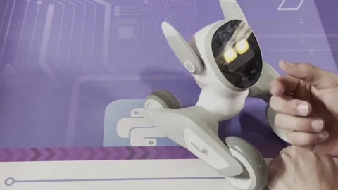 A robot is being controlled by a person's hands Stock Footage 279823413