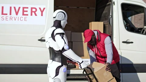 Robot brings parcel boxes on a trolley and african american delivery man put Stock Footage 166173987