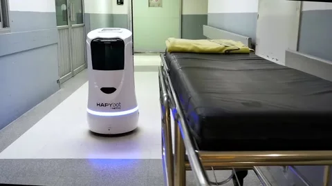 Robot call “HAPYbot” moving to ER at Maharaj Nakorn Chiang Mai Hospital. Stock Footage