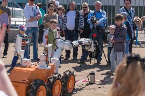 Robot with carnation Stock Photos