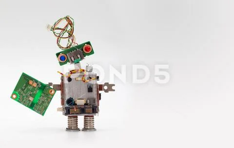 Robot with chip board. Computer accessories toy mechanism, funny head Stock Photos